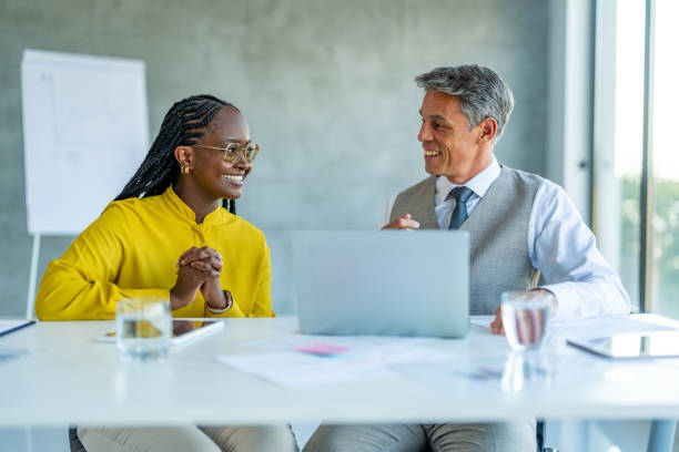 istock Discussing Business with Colleague 1707280723