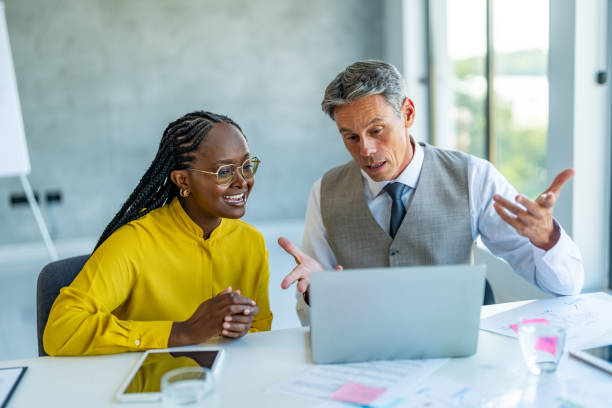 istock Leader and boss working as a team to plan the vision and mission for growth and development 1707281293