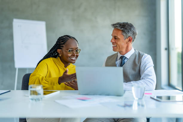 istock Team of Two Creative Entrepreneurs Talk, Discuss Growth Strategy. 1707281615