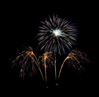 Colorful fireworks display isolated on black background for new year celebration and anniversary