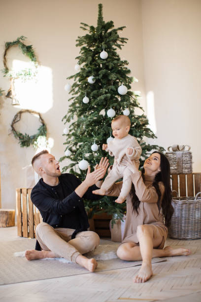 istock Parents having fun with daughter during winter holidays 1707304066