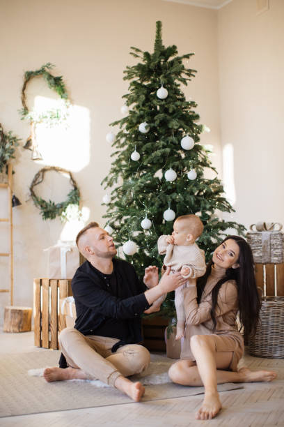 istock Parents having fun with daughter during winter holidays 1707304103