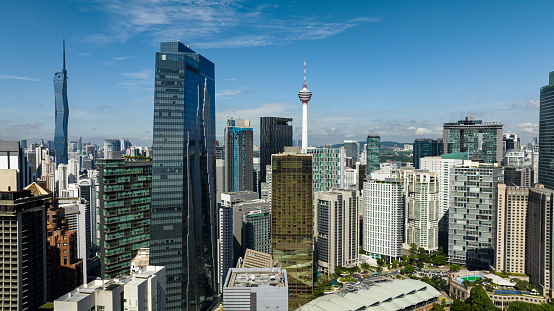 Kuala Lumpur, Malaysia - September 11, 2022: Kuala Lumpur downtown district. Merdeka Tower, Menara Kuala Lumpur.