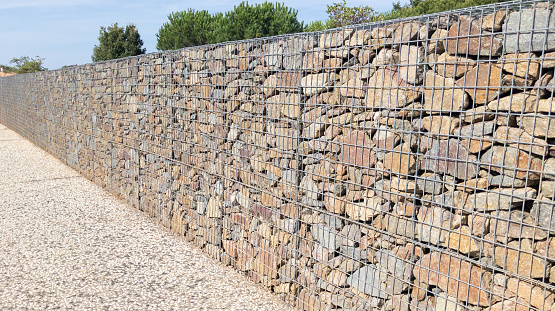 gabion fence big cage stone in wire mesh wall horizontal stones facade