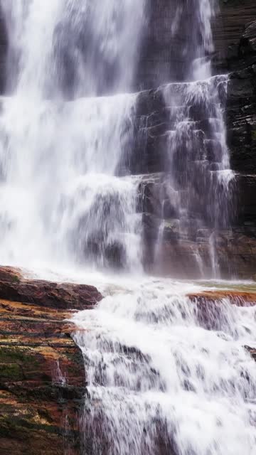 Waterfall in the tropical mountain jungle. Sri Lanka.