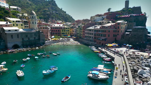 Aerial view of the City of Vernazza in Cinque Terre, a famous landmark in Liguria, Italy, travel destination in Europe, Colorful Rocky Town of Vernazza in Cinque Terre, Beautiful view of a coastal fishing village, Aerial view of Italy, Vernasa