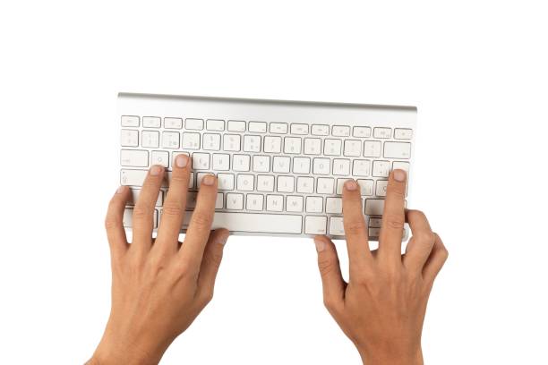 istock Office desk table Top view with keyboard and hand no background 1707374527