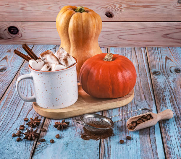 istock Delicious pumpkin latte with spices in a white ceramic cup 1707378180