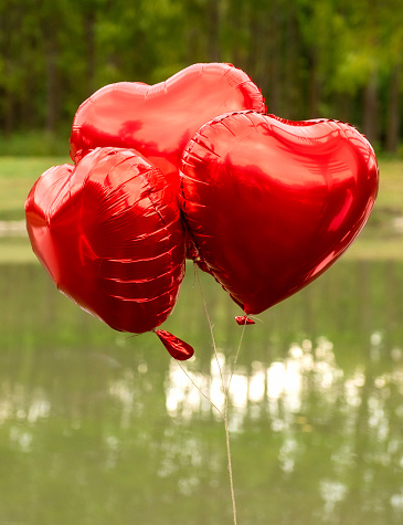 Red heart shaped balloons outdoor