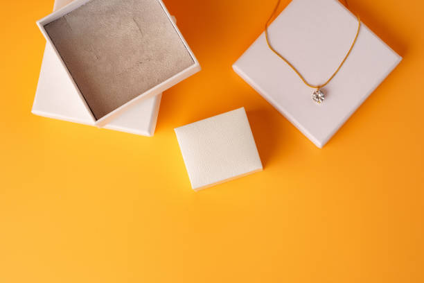 istock Jewelry box on yellow background top view 1707385322