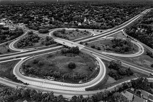 Aerial view of a highway intersection in black and white