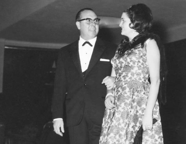 istock Couple at a party in1960. 1707430014