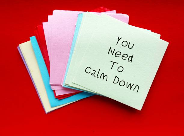 istock Message note YOU NEED TO CALM DOWN - self-reminder to stop workplace drama, avoid conflicts and reduce toxicity in office environment 1707433237