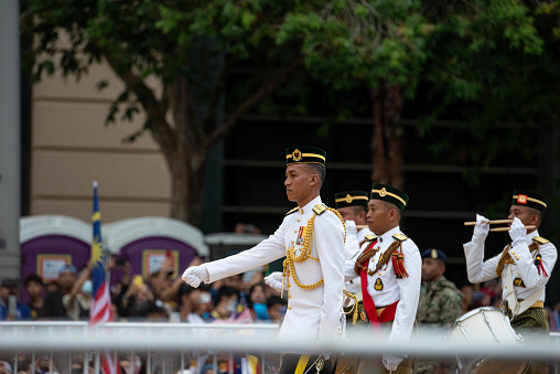 Putrajaya, Malaysia - August 31, 2023: Close up view of the parade contingent marching at the 66th Independence of Malaysia in Putrajaya.