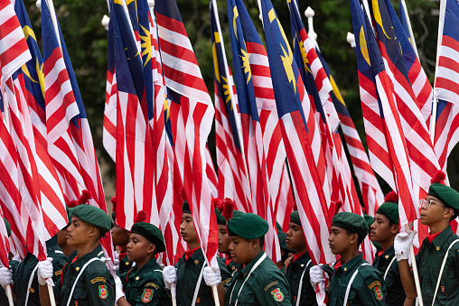 Putrajaya, Malaysia - August 31, 2023: Flag parade from Malaysian uniformed forces. Celebrating the 66th anniversary of Independence Day or Merdeka Day.