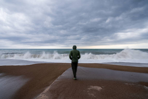 istock Man Walking To The Beach 1707439406