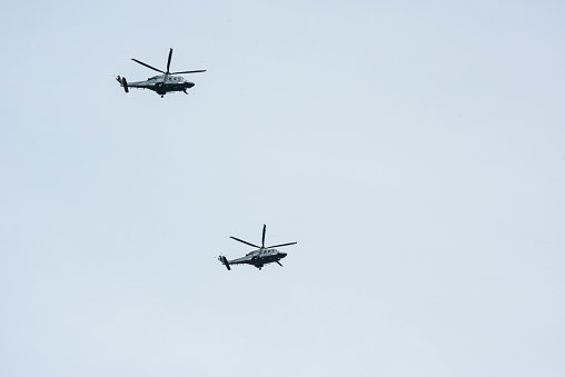 Zumpango, Mexico - September 11, 2018: General practice of the aerial parade of the anniversary of the independence of Mexico, training landing at Tecamac (Mexico State), being followed by the Sikorsky UH-60M
