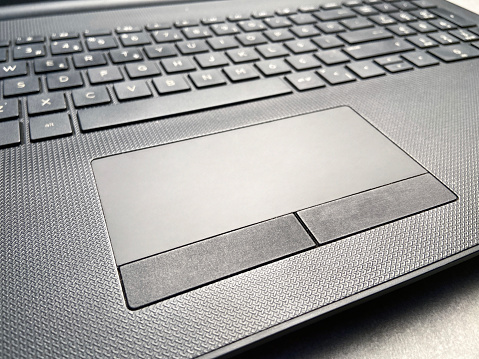 Laptop touchpad and keyboard