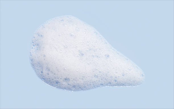istock Skincare cleanser foam texture with bubbles isolated on pastel blue background. Soap shampoo face wash cleansing musse product sample 1707507923