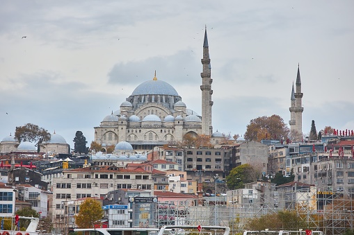 Istanbul, Turkey - November 22, 2021: City buildings in the center of Istanbul. View from the bay.
