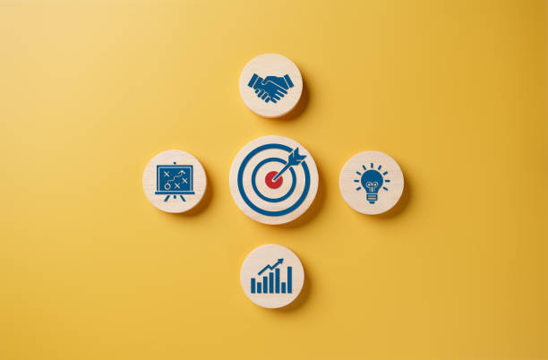 istock Business aim and set a target achievement concept. Project direction, teamwork, and idea creativity for working success. Dartboard, strategy brainstorming, and work together icons on wooden circles. 1707526388