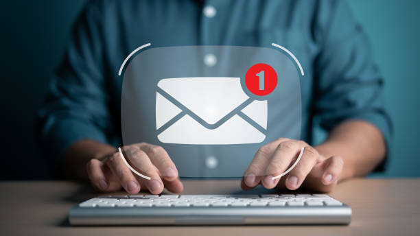 istock Email marketing and client advertisement concept. Businessman typing on keyboard for reviewing before sending email to customer, online promotion. Business e-mail communications and digital marketing. 1707531471