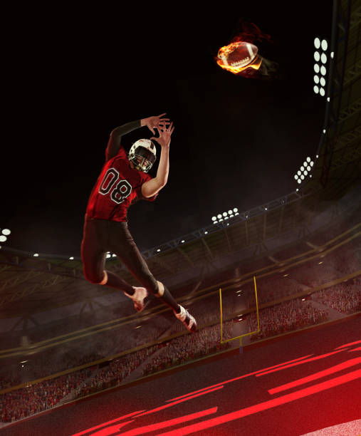 istock Dynamic image of competitive man, american football player catching ball with fire effect on stadium. Game on. 3D render. 1707542403