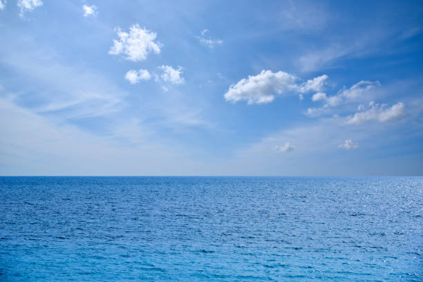 istock View of the open sea with cloudy blue sky 1707570175