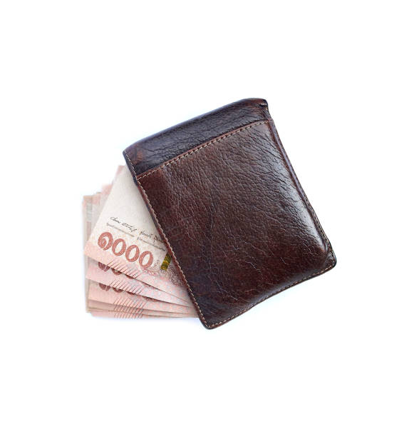istock Wallet and Thai banknote and cash isolated on white background 1707668301
