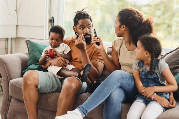 istock Young black parents arguing on sofa at home. 1707673715