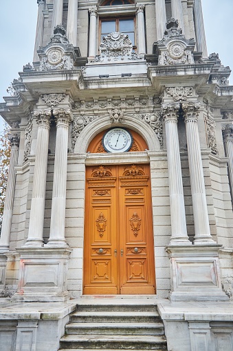 Istanbul, Turkey - November 23, 2021: Clock tower at the entrance to the Dolmabahce Palace.