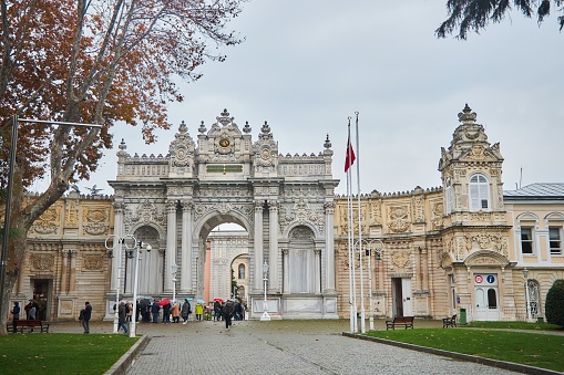 Istanbul, Turkey - November 23, 2021: The famous Dolmabahce Palace. The gate at the entrance to the territory.