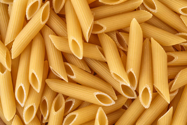 istock Macaroni, pasta, made by durum wheat.Pasta background. Testure for design. 1707719096