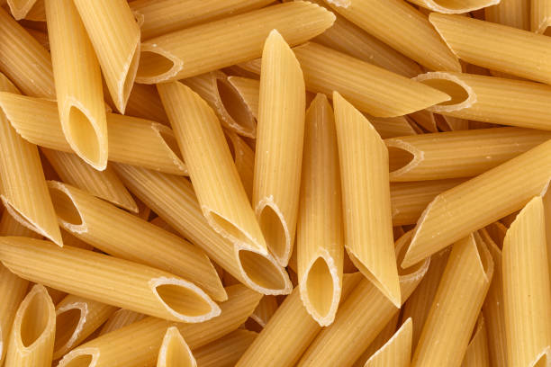 istock Macaroni, pasta, made by durum wheat.Pasta background. Testure for design. 1707719097