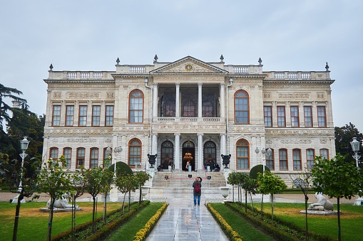 Istanbul, Turkey - November 23, 2021: The famous Dolmabahce Palace. Entrance to the palace from the end of the building.