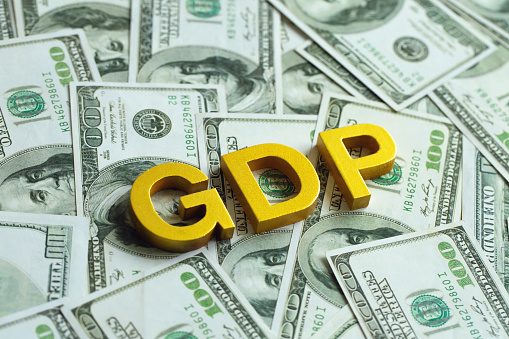 Gross domestic product concept.Gold GDP Text on dollar bills. the idea for monetary policy, Financial, Management, Economic, Inflation, Business, and growth of GDP