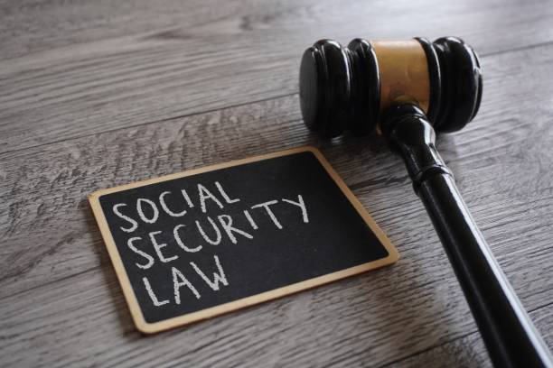 istock Judge gavel and chalkboard with text SOCIAL SECURITY LAW. 1707764525