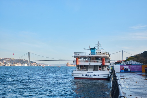 Istanbul, Turkey - November 23, 2021: The Bosphorus Strait. A pleasure ship is moored.