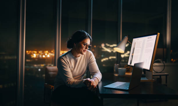 istock Business woman having a virtual meeting while working late in her home office 1707781111