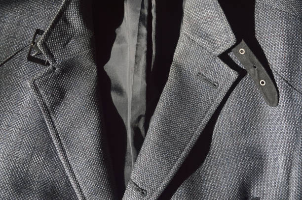 istock background for the design. cotton fabric texture, men's jacket. modern clothes. accessories for sewing. 1707783864