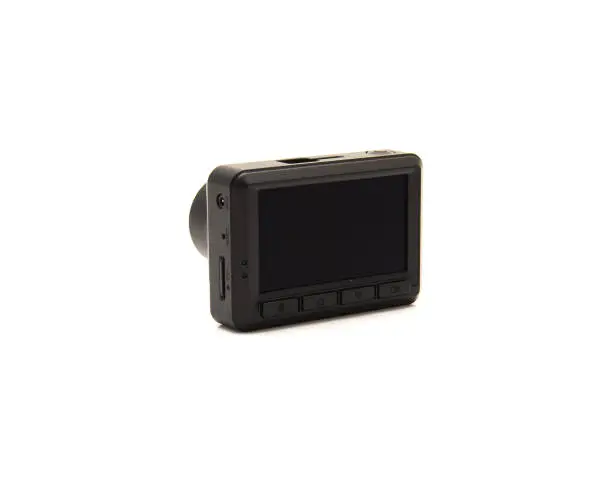 Rear view black dash cam camera with USB-A power input, navigation buttons and Full HD 1080P IPS display isolated on white background, safety and surveillance solution. Clipping path copy space