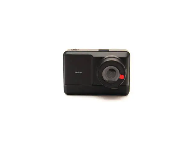 Brand new back dash cam camera with wide-angle lens and Full HD 1080P IPS display isolated on white background, safety and surveillance solution transportation. Clipping path and copy space