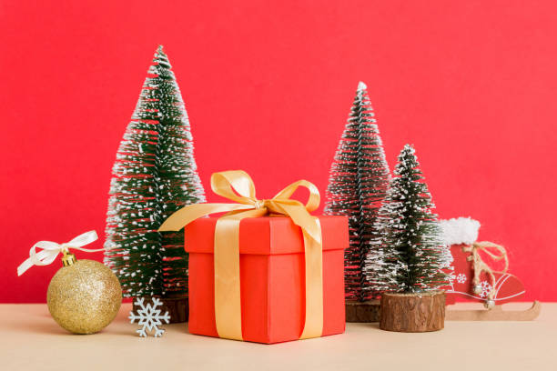 istock Christmas composition. craft Gift box, small tree, branches and craft DIY decorations on white background. New year concept. Christmas home decoration Flat lay, top view, copy space 1707832900
