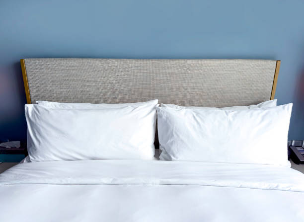 istock White cushion and white pillow as Modern bedroom interior with a stylish combination of trendy room interior 1707834322