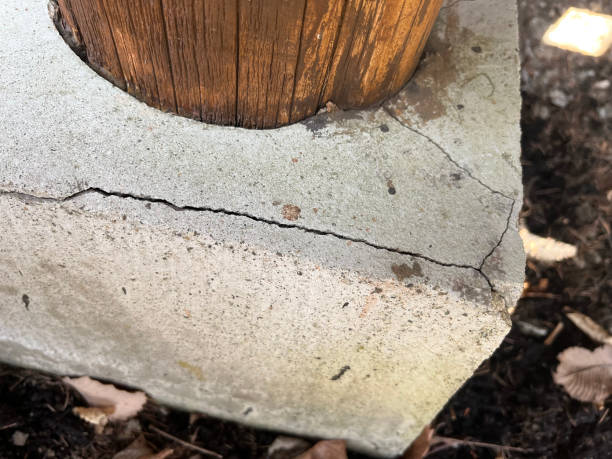 istock Cracked concrete house foundation stone 1707838214