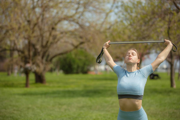 istock Blonde athlete lady is warming up before exercise. 1707855292