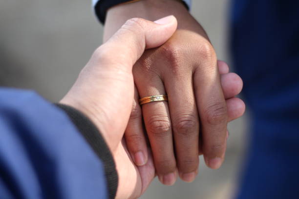 istock Hands of a couple joining hands 1707870255