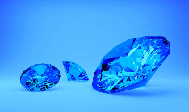 istock Blue gems or diamonds, bright blue background 1707881708