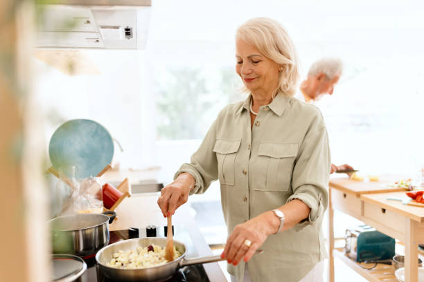 istock Beautiful senior woman preparing a lunch 1707901918