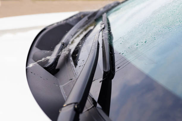 istock water running down the windshield of a car 1707902484